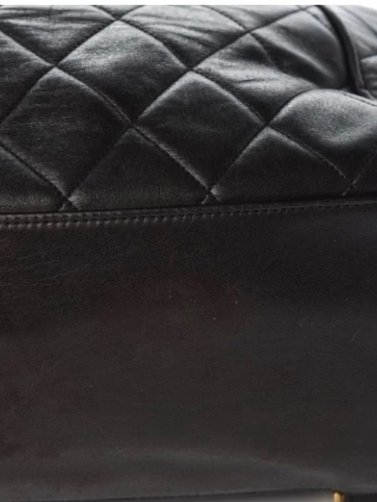 CHANEL Black Quilted Leather Backpack with Gold CC Emblem - Picture 8 of 8